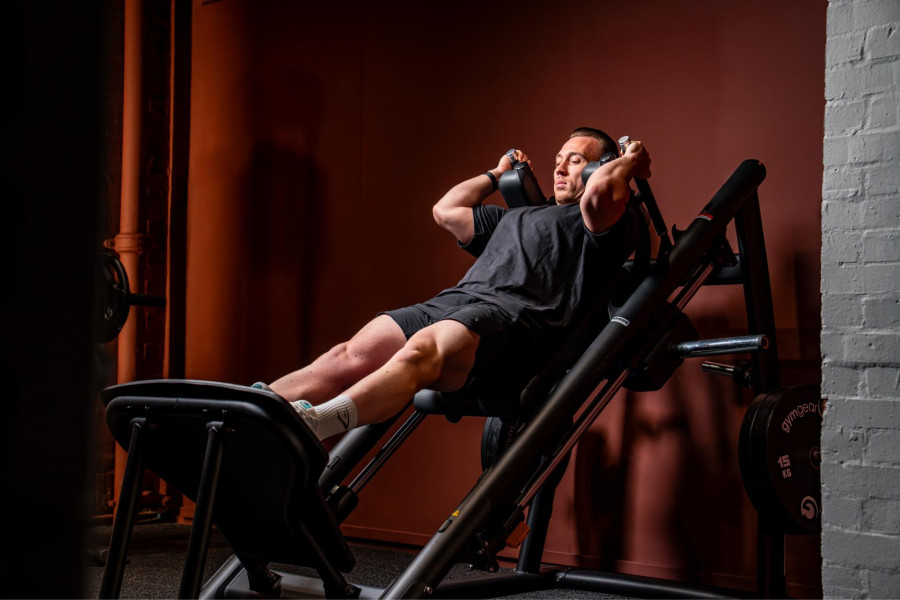 Someone doing leg machine